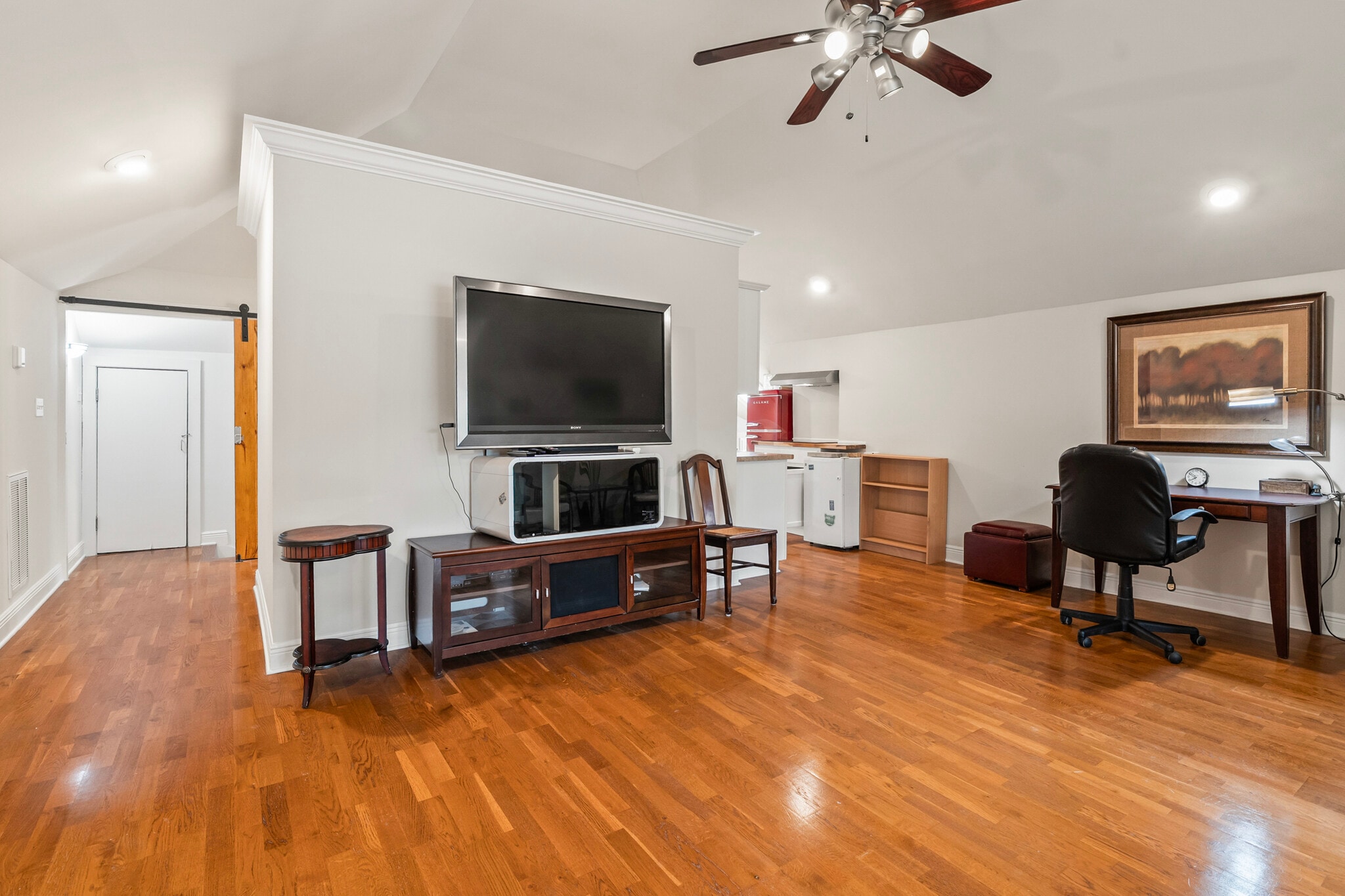 Living area upstairs flows into separate kitchen-dining area - 305 E 14th Ave