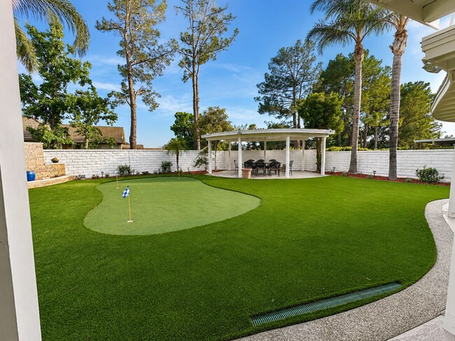 Building Photo - Furnished 4BR + Office | Putting Green Yard