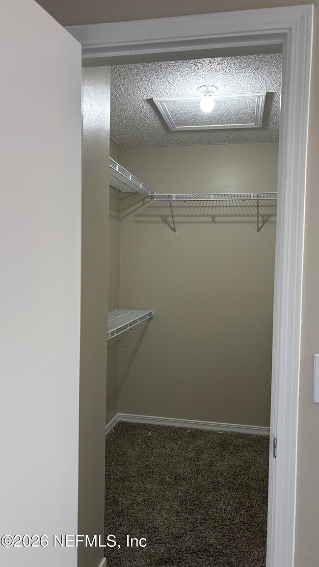 Building Photo - 11467 Fort Caroline Lakes Dr N