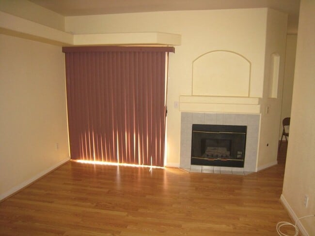 Building Photo - 2nd Story Condo in gated community close to the pool.