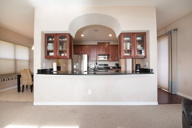 Building Photo - Large, Executive style 3/2.5 Lakefront/POOL Home in East Park of Lake Nona