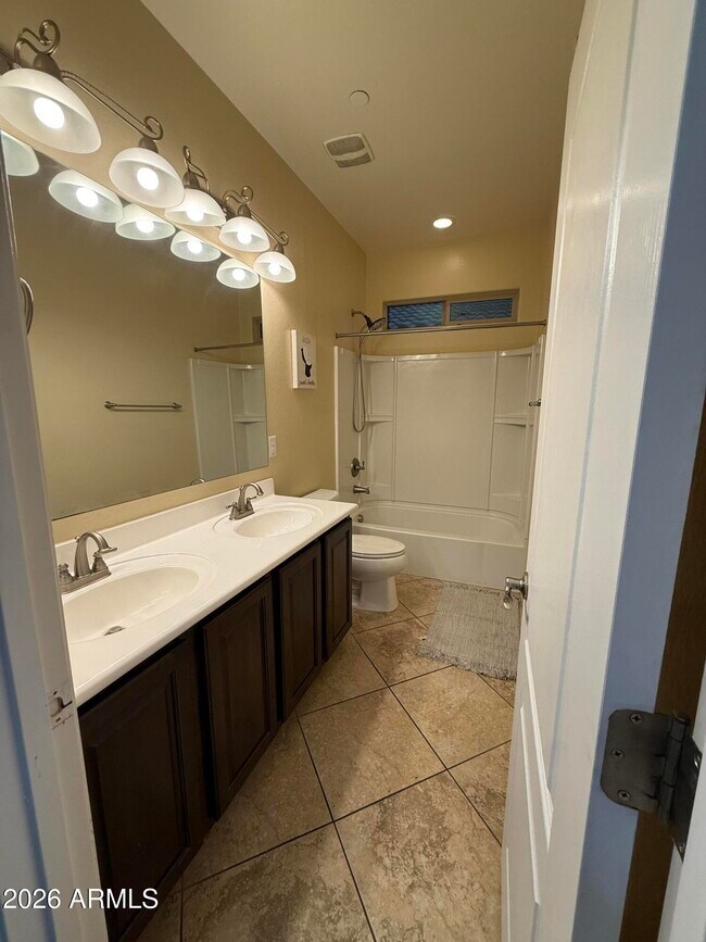 Building Photo - 9242 W Meadow Dr