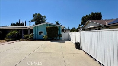 Building Photo - 7845 Woodlake Ave