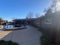 Building Photo - Beautiful 2 Bedroom/2 Bathroom Home with a Great Room, Fireplace and access to shared swimming pool