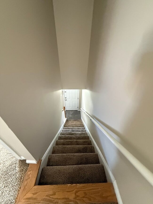 Building Photo - 2-bedroom, 1.5-bath townhouse with an attached garage