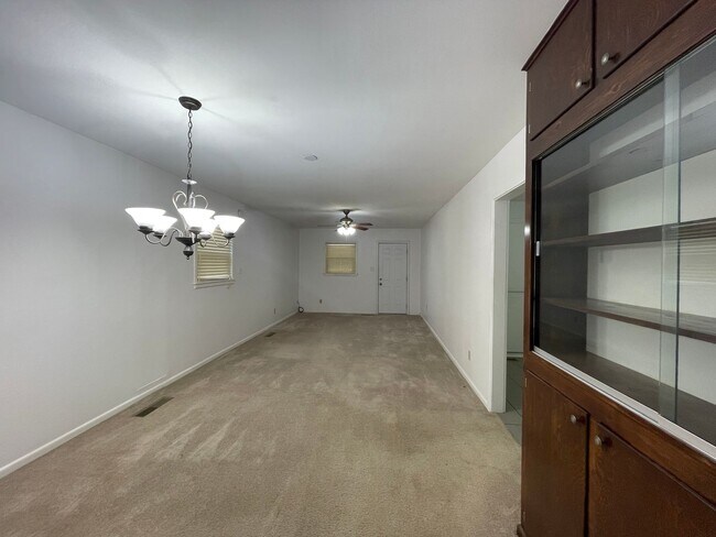 Building Photo - Your New Snyder Sanctuary: Modern Updates, Massive Storage & a Cozy Porch