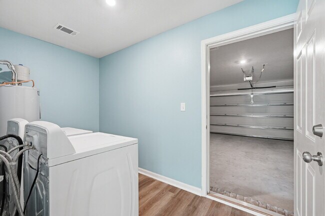 Building Photo - New community! Three bedrooms, two bathrooms and ready for you to move into!