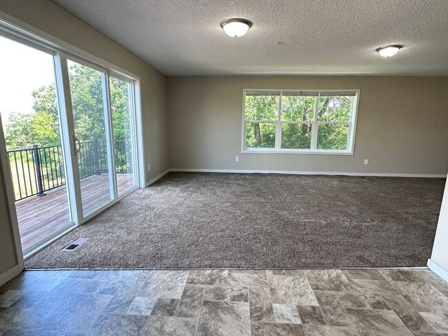 Building Photo - Champlin Corner Unit Town Home, 2 Car Garage, Dishwasher, Washer/Dryer, Balcony