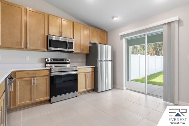 Building Photo - FULLY FENCED, LIKE NEW 3/2/1 TOWNHOUSE ON A CUL DE SAC IN BEAUTIFUL SEMINOLE WOODS