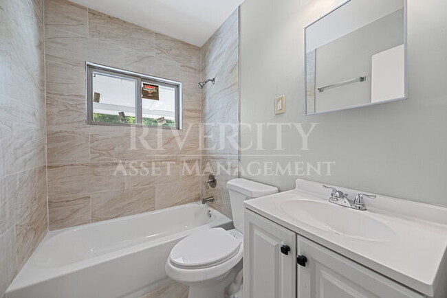 Building Photo - A Must See/ High Vaulted ceiling's & Section 8 Welcome!!!