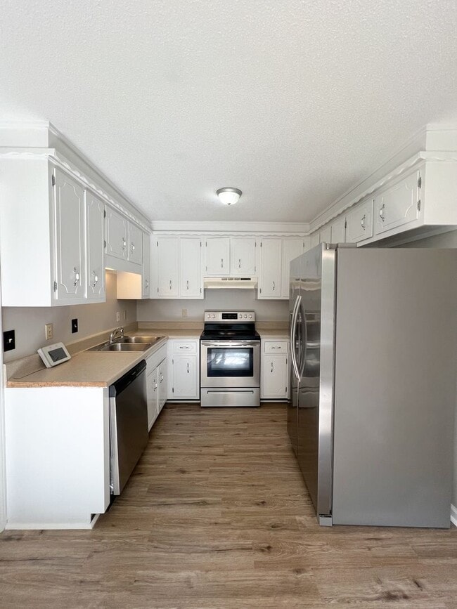 Building Photo - Move-In Specials Available! Large Deck and...