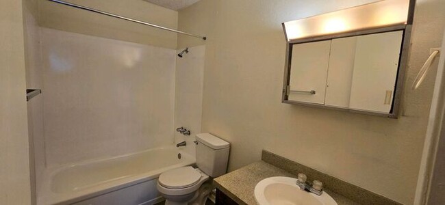 Building Photo - Tour Today! Newly Updated 2/1.5 Townhome i...