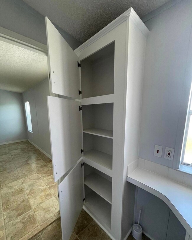 Building Photo - 8179 Sandwedge Terrace