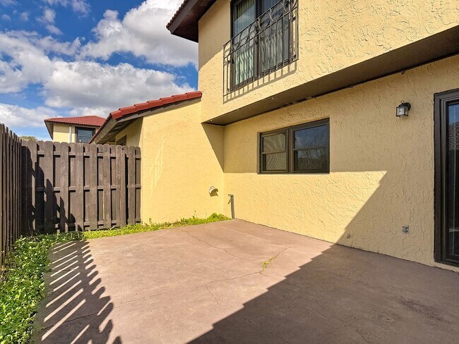 Building Photo - Spanish-Style 3 Bedroom, 2.5 Bath Mediterranean Rooftop Townhouse – Basic Cable & Wi-Fi Included!