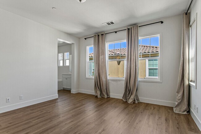 Building Photo - Stunning 4-Bedroom Home in Gated Tribella Community!