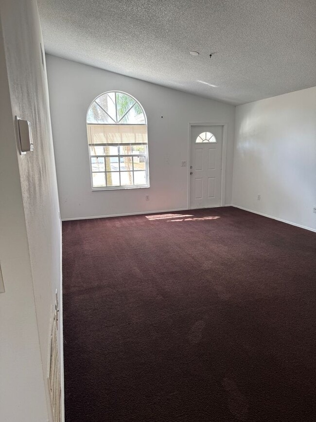 Building Photo - Beautiful Home with Cathedral Ceilings