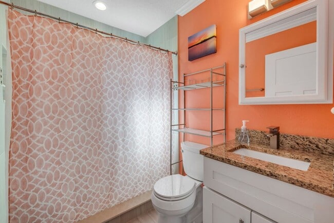 Building Photo - Renovated Spanish-Style 2/1 Beach Bungalow...