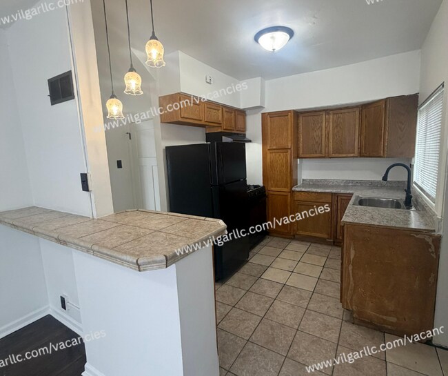 Building Photo - 600 W 46th Ave
