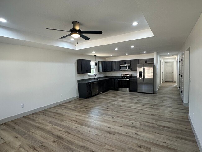 Building Photo - NEW 5 Bed 3 Bath w/ Walk Out Basement Waynesville School District