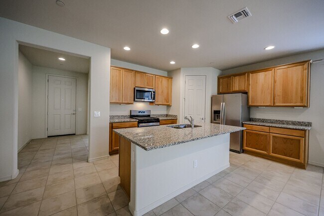 Building Photo - 4 Bedroom + Den in Foothills at Northpointe