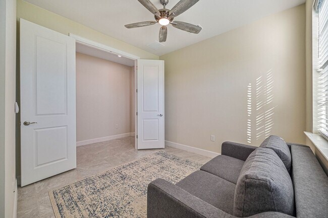 Building Photo - **Coach Home w/ Private Pool in Esplanade Lake Club **