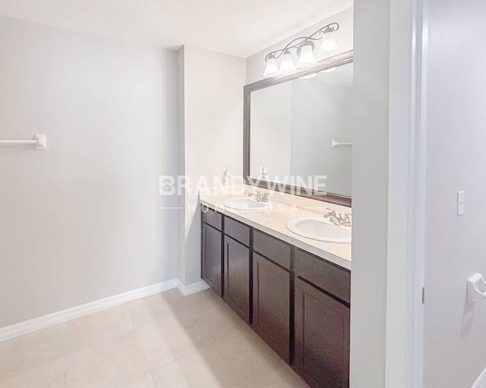 Building Photo - 12026 Suburban Sunrise St