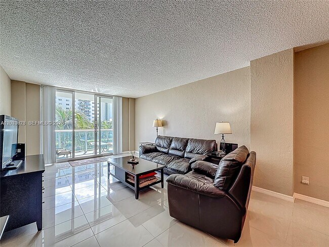 Building Photo - 19380 Collins Ave