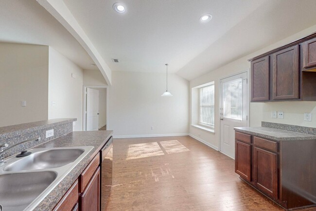 Building Photo - Spacious and Welcoming 4-Bedroom Home with...