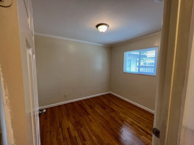 Building Photo - Two-bedroom single story unit with a carport!
