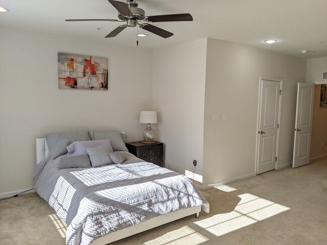 Building Photo - Bottom level (two story) *END UNIT* condo ...