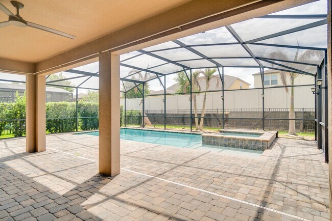 Building Photo - Stunning 3-Bedroom Pool Home with Bonus Room in the Gated Community of Lakeshore at Narcoossee