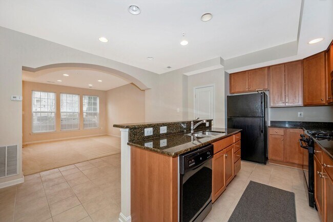 Building Photo - Desirable Two Level Condo For Lease - Not Pet Friendly