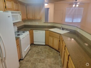 Building Photo - Clean and cozy 2 bed condo in gated commun...