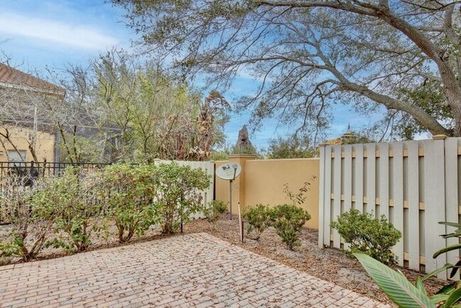 Building Photo - AGENT SHOWINGS ONLY! Stunning 3/2.5 Corner Unit Townhome with a Spacious 2 Car Garage in the Gate...