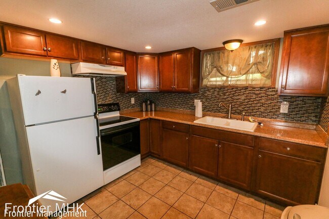 Building Photo - 4 br, 2 bath House - 118 S Manhattan Ave.