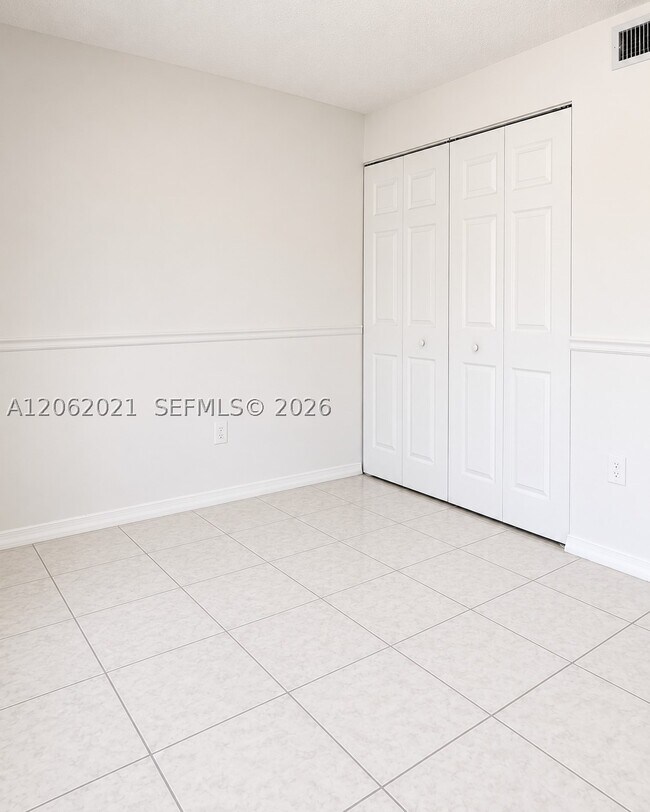 Building Photo - 6095 W 18th Ave