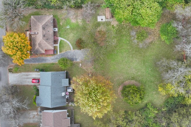 Drone shot of home and neighbor's house - 1709 Roger Ave