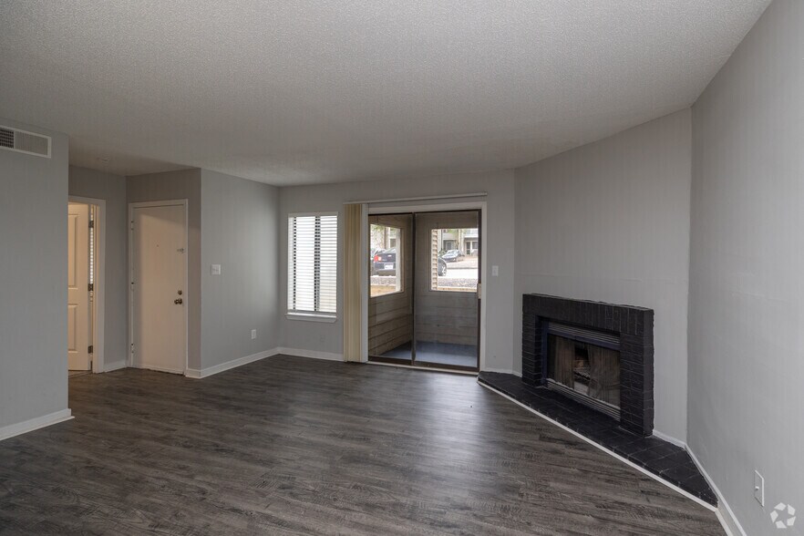2BR, 2BA - 875SF - Living Room - The Bluffs Apartment Homes