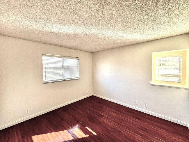 Building Photo - 2 Bedroom, 2 Bath Upstairs Condo with Private Balcony & 2-Car Garage, Gated Community, Water/Tras...