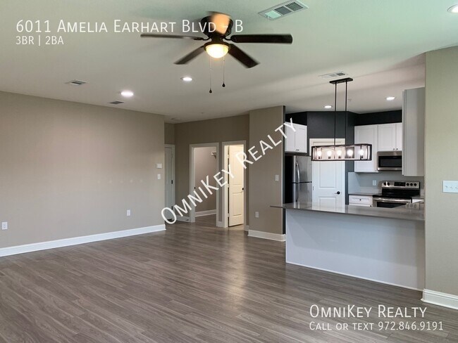 Building Photo - 6011 Amelia Earhart Blvd