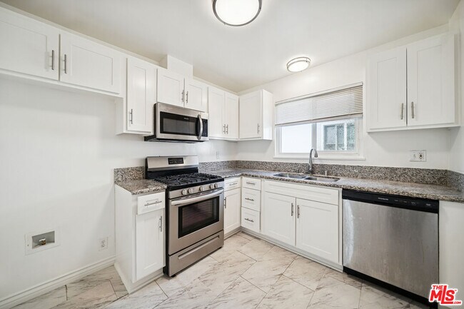 Building Photo - 3652 Carmona Ave