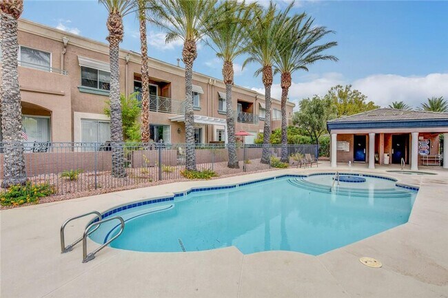 Building Photo - Amazing condominium in gated upscale neigh...