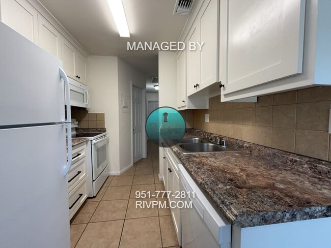 Building Photo - CHARMING 2-BEDROOM CONDO FOR RENT IN RIVER...