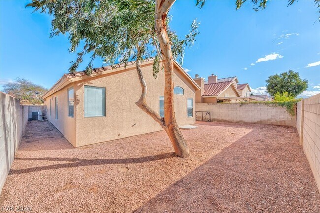 Building Photo - 8997 Living Rose St