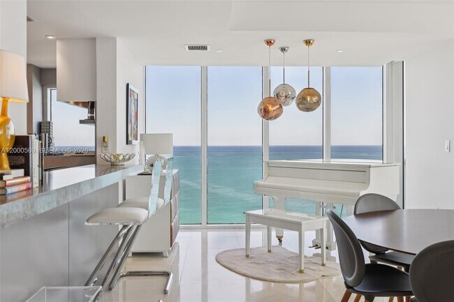 Building Photo - 10275 Collins Ave