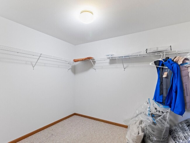 Building Photo - Spacious 3BR/3BA Condo with Finished Basement + 2-Car Garage — Available Now