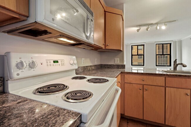 Building Photo - $400 Off! Professionally Managed, Spacious...