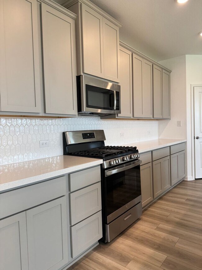 Building Photo - 4 BR/2.5BA | Newly Renovated Single Family Home | 1-Car Covered Parking | Gated backyard