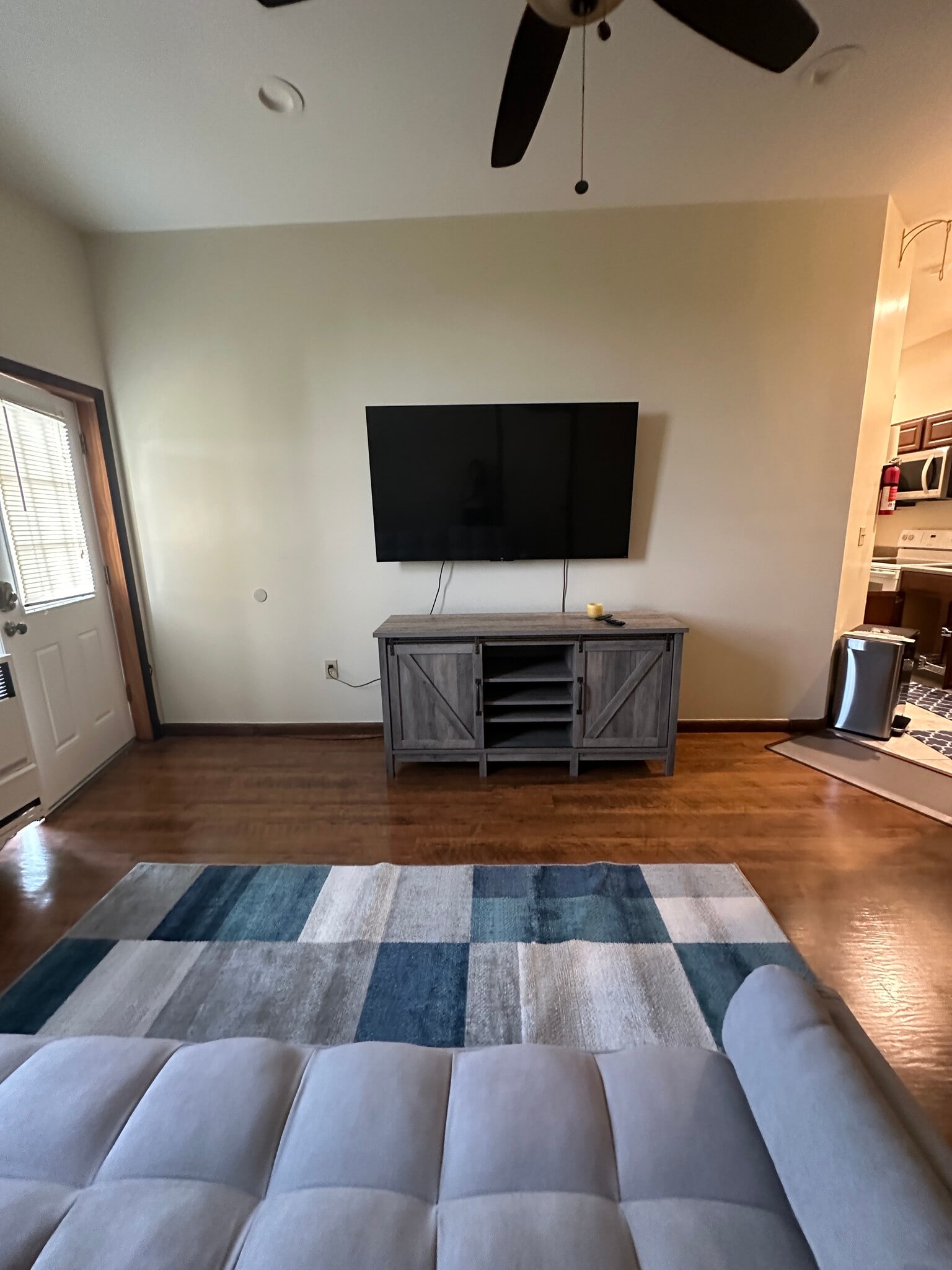Large, wall-mounted TV’s (LR/BR) are adj for you. LR credenza for buffet, storage/bar… w/sliding drs - 851 9th St