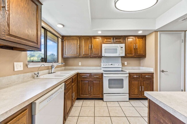 Building Photo - "Charming garden home offers 3-Bedroom Sanctuary with Cozy Fireplace in San Antonio – 1710 Sq Ft ...